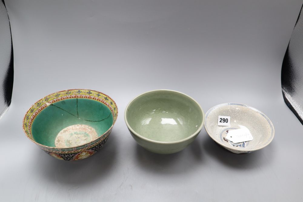 A Chinese celadon bowl, a Thai market famille rose bowl and a crackle glaze bowl